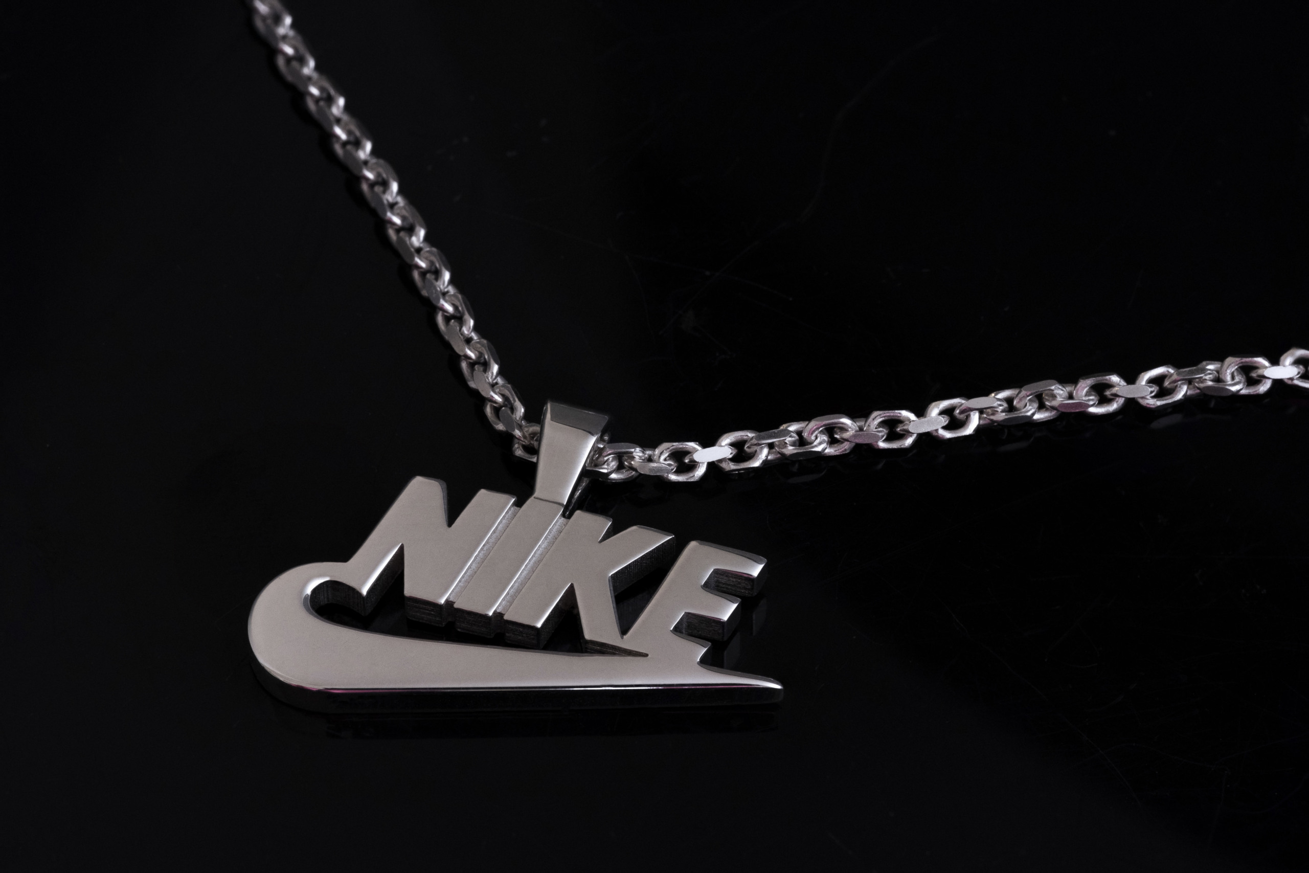 FRONT - custom-made Nike pendant with engraving